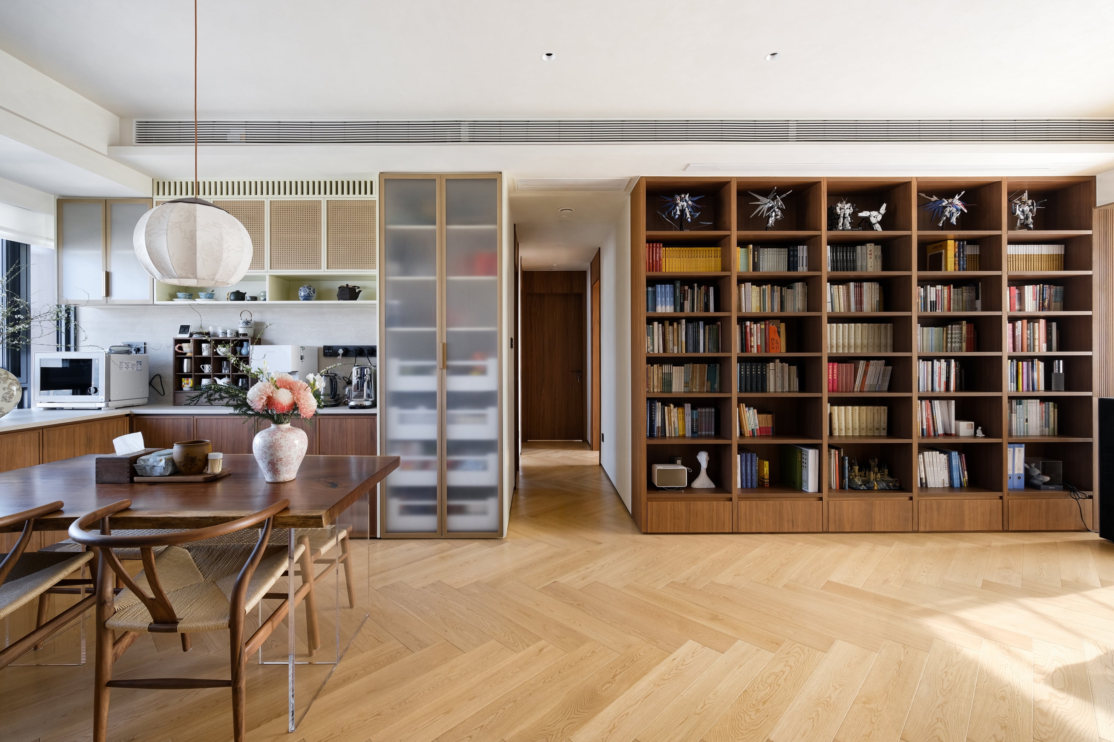 Custom Walnut Library Wall with Integrated Storage