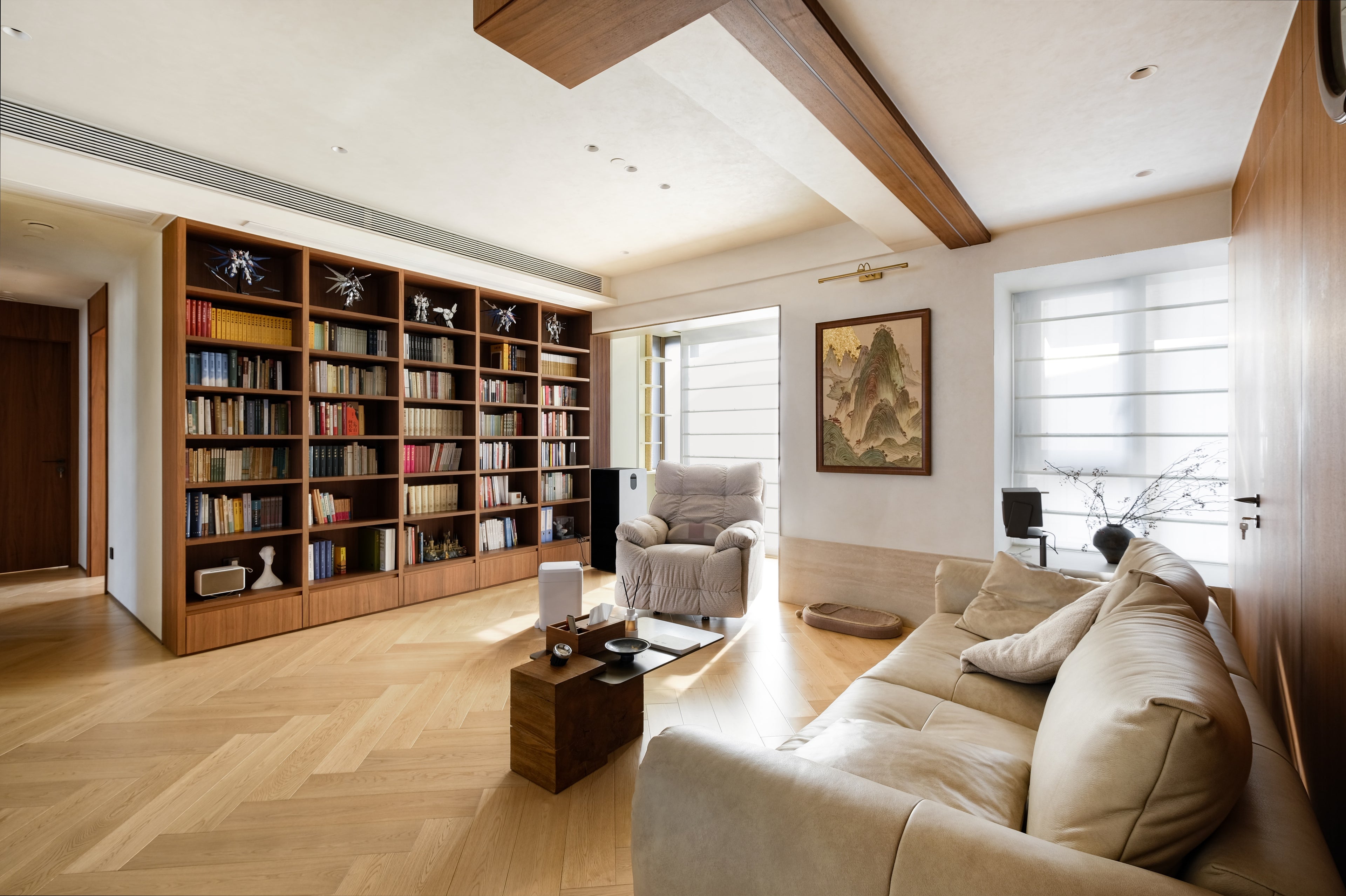 Custom Walnut Library Wall with Integrated Storage