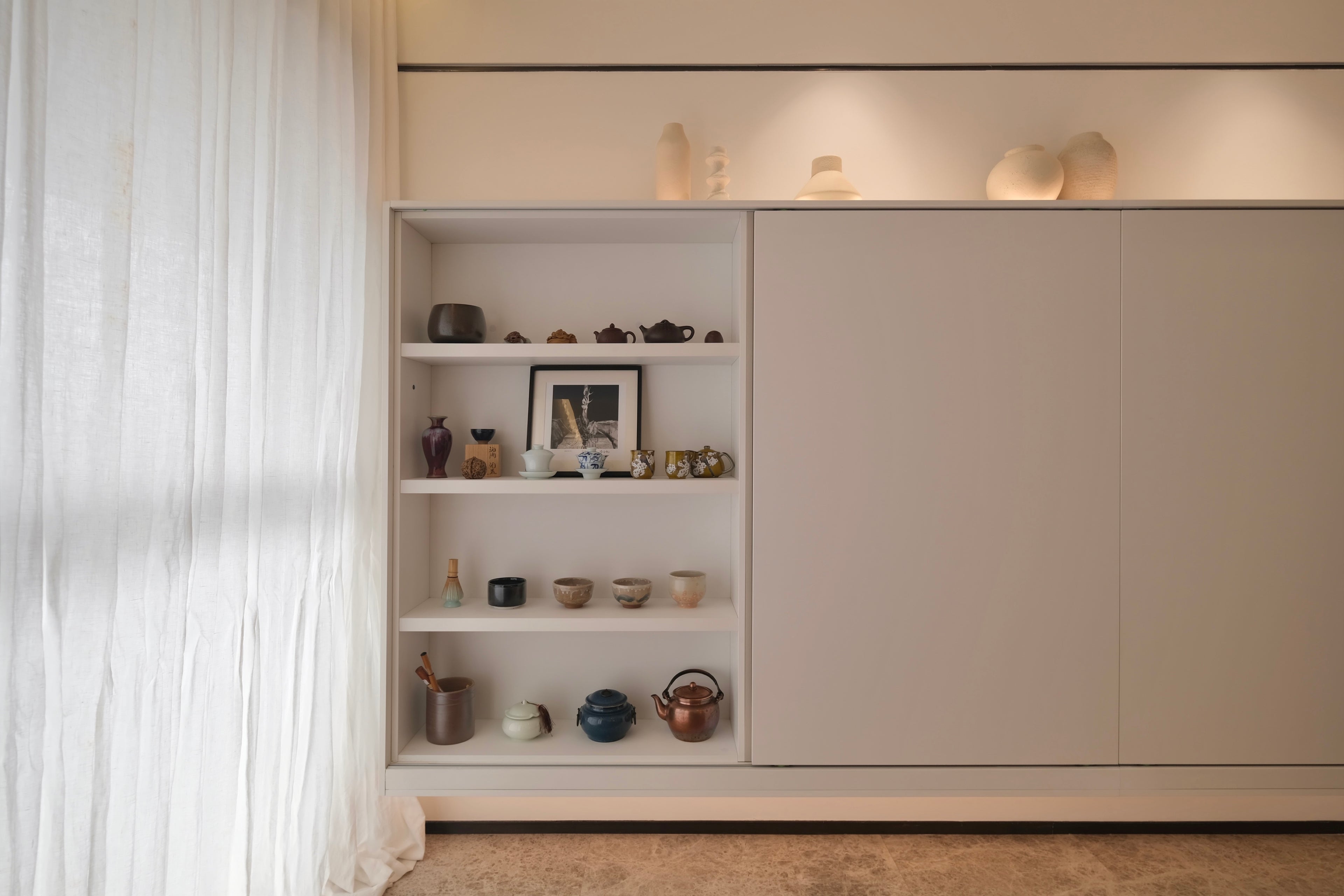 Custom Lacquered Storage Wall with Open Display Niche