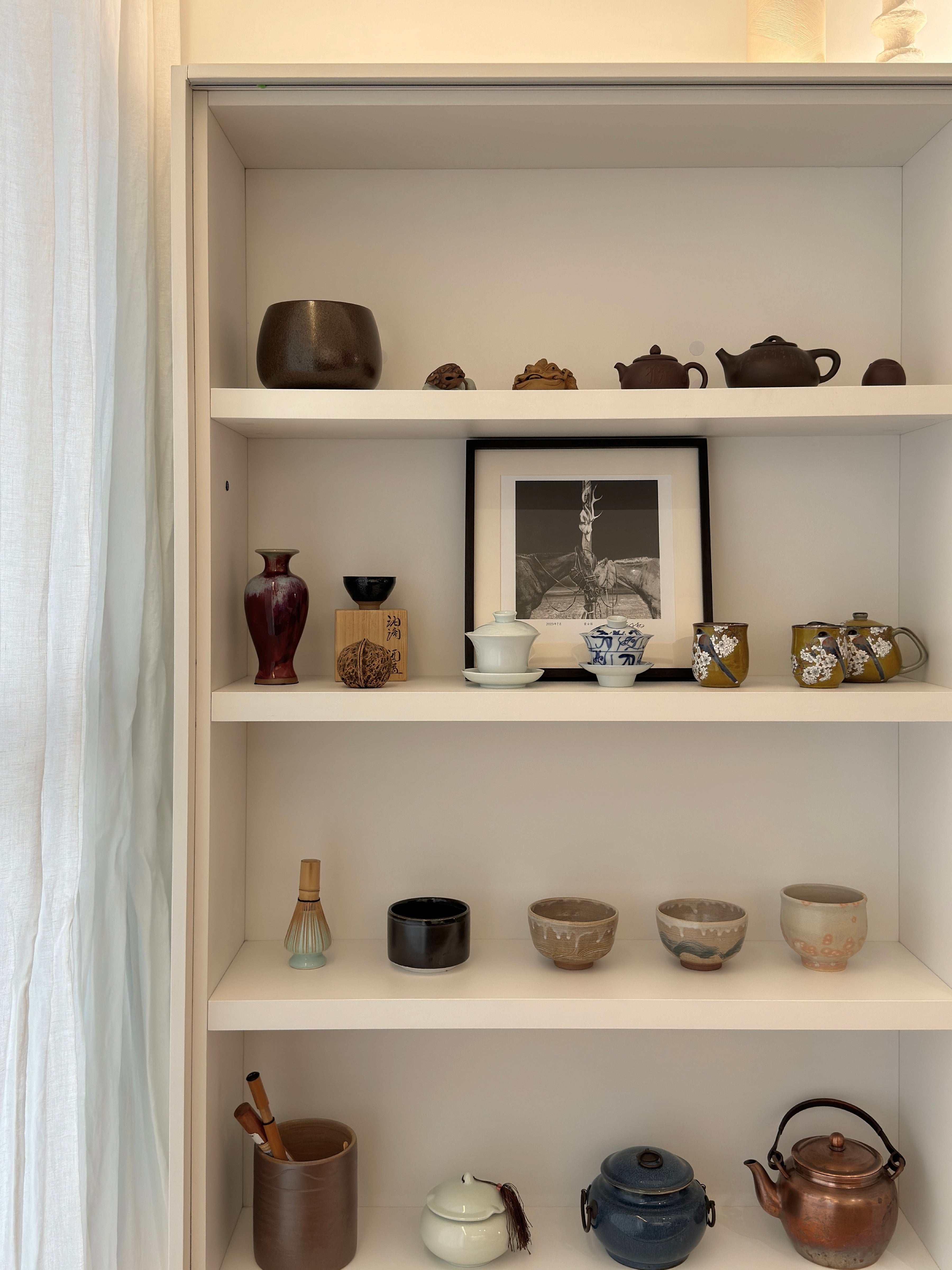 Custom Lacquered Storage Wall with Open Display Niche