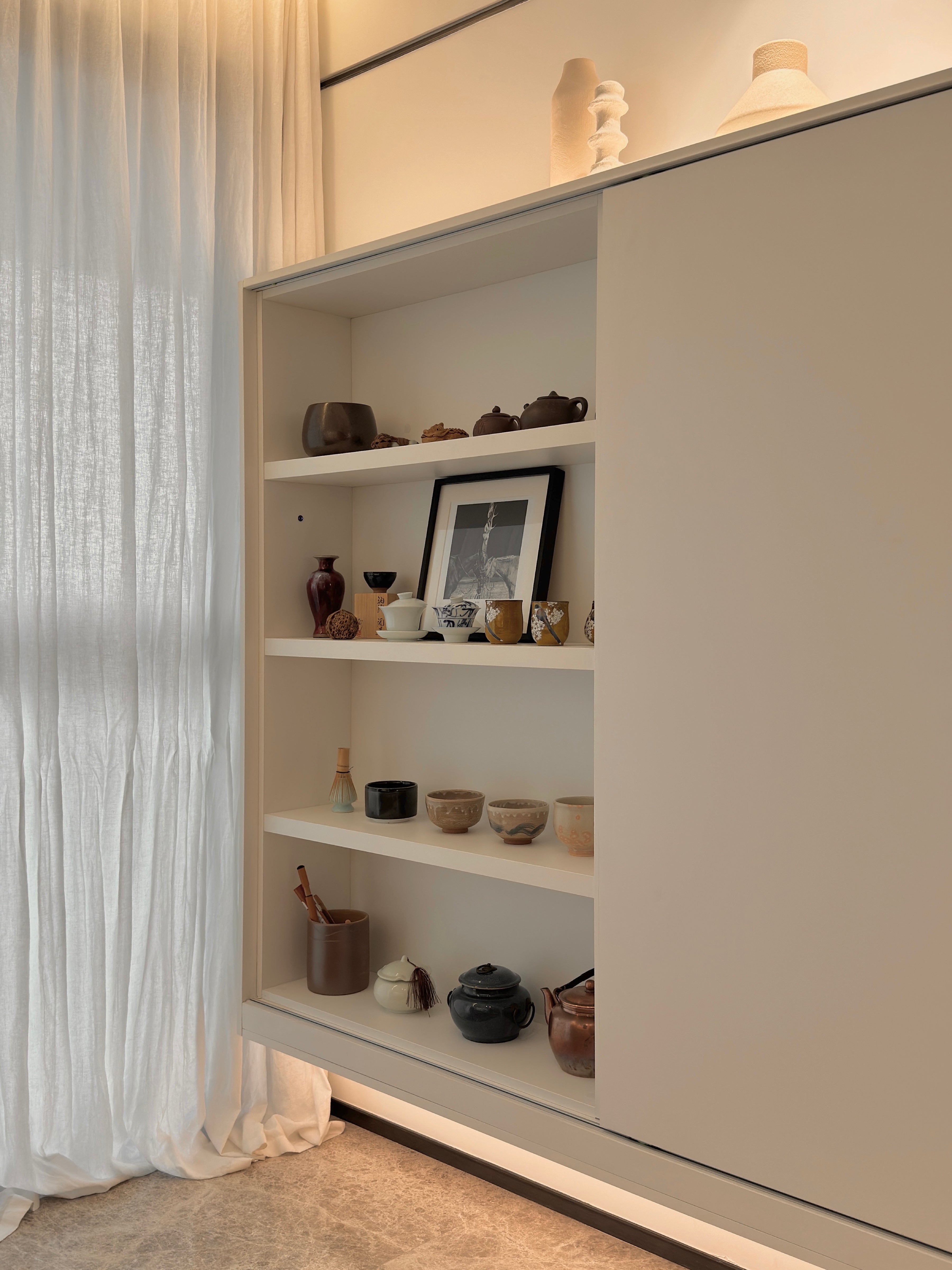 Custom Lacquered Storage Wall with Open Display Niche
