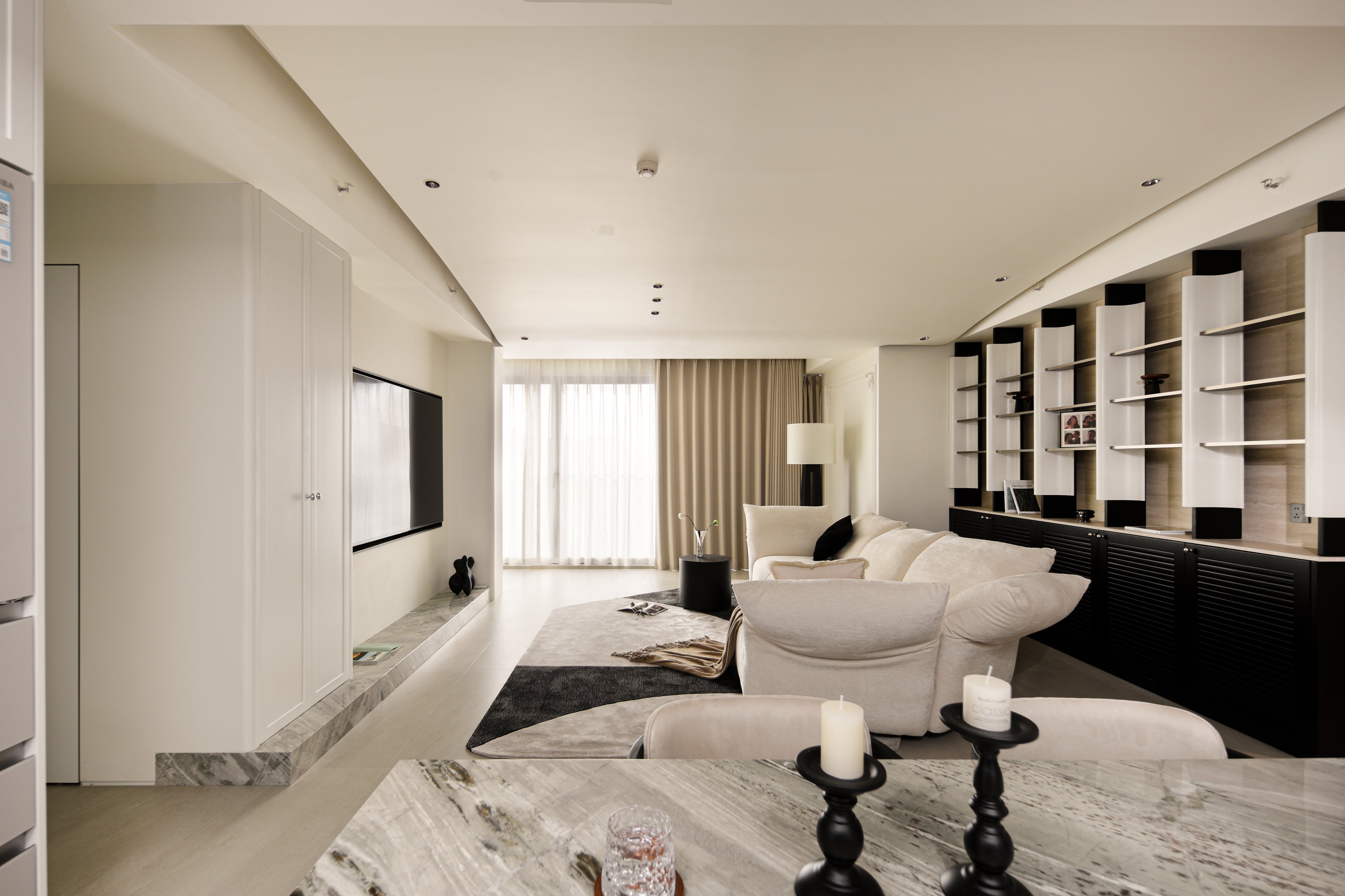 Custom Illuminated Sculptural Shelving Wall with Louvered Base Cabinet