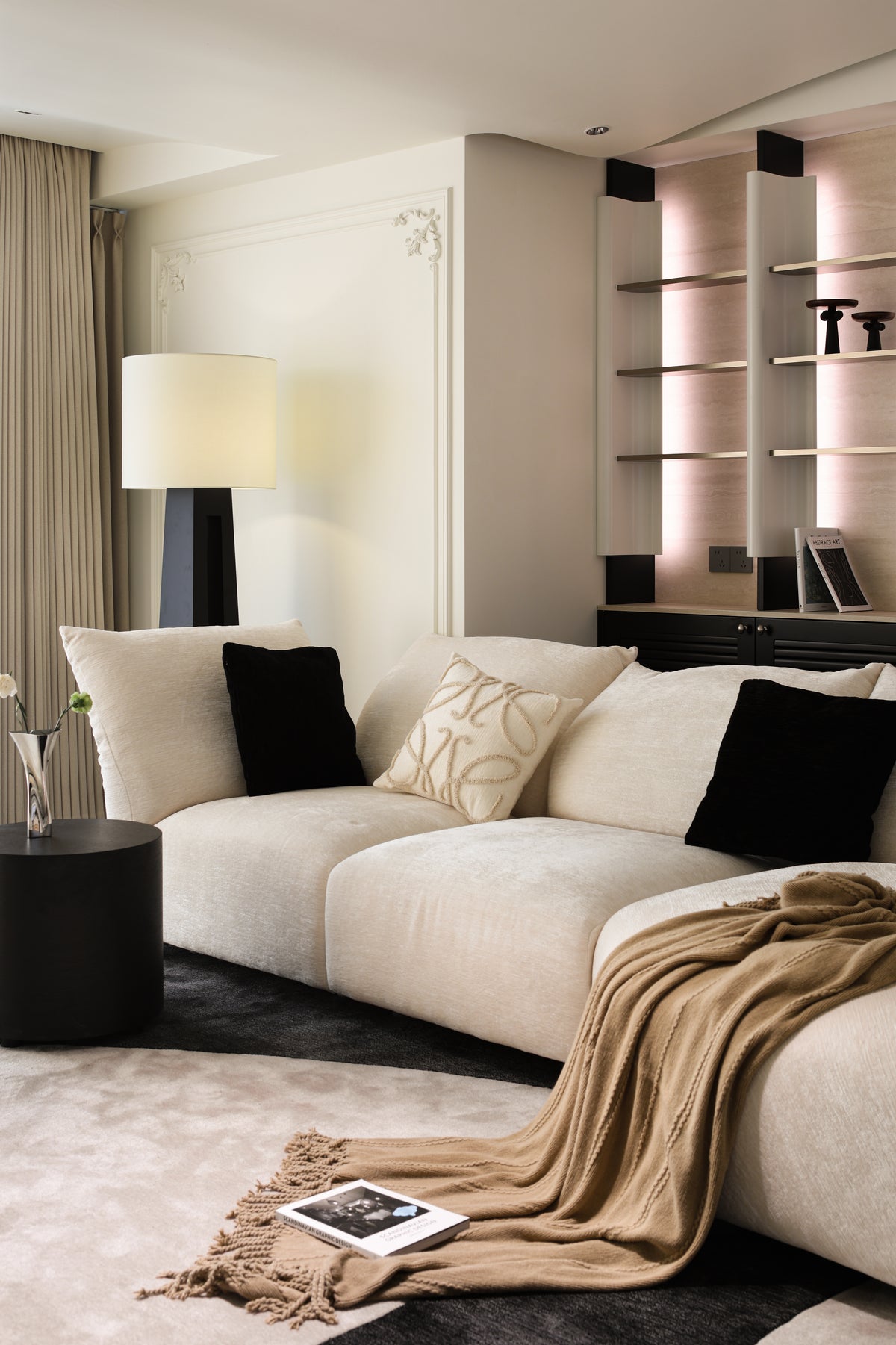Custom Illuminated Sculptural Shelving Wall with Louvered Base Cabinet