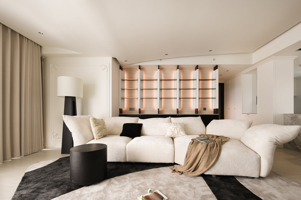 Custom Illuminated Sculptural Shelving Wall with Louvered Base Cabinet